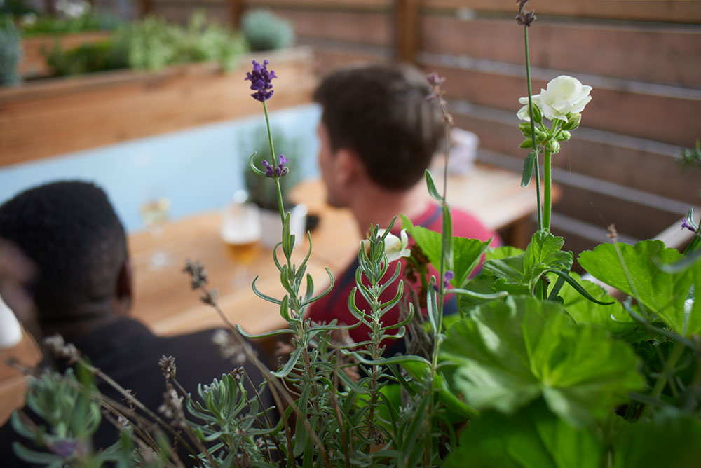 People drinking in our all weather pub garden