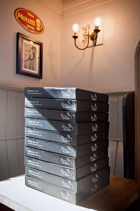 Boxes of pizzas ready for delivery